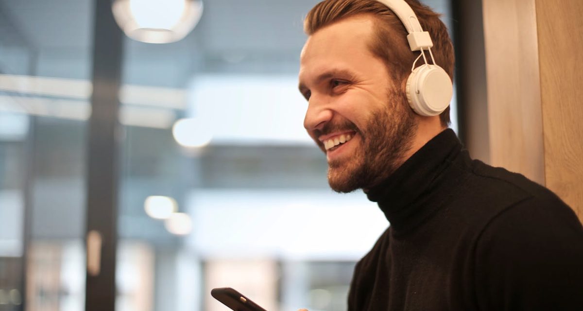 Person learning a language with headphones