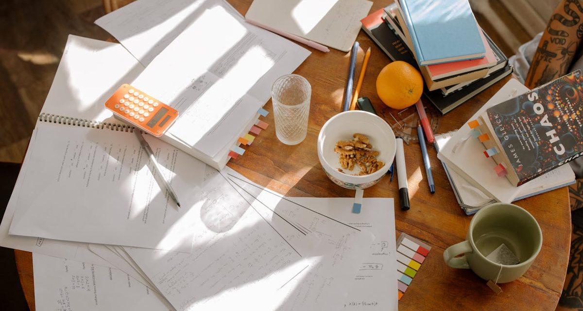 Study notes and coffee on a desk